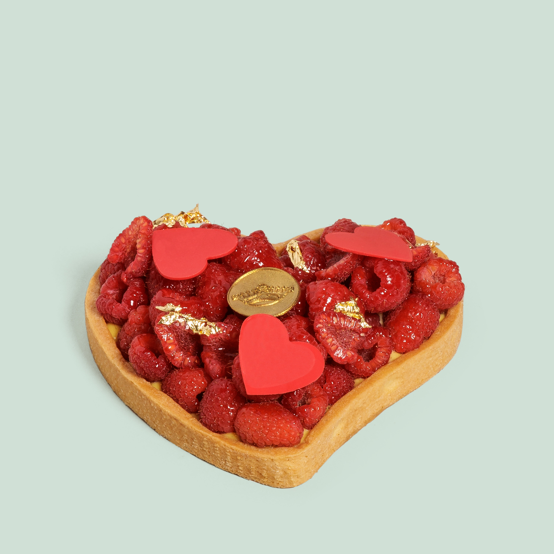 Heart-shaped tart with raspberries