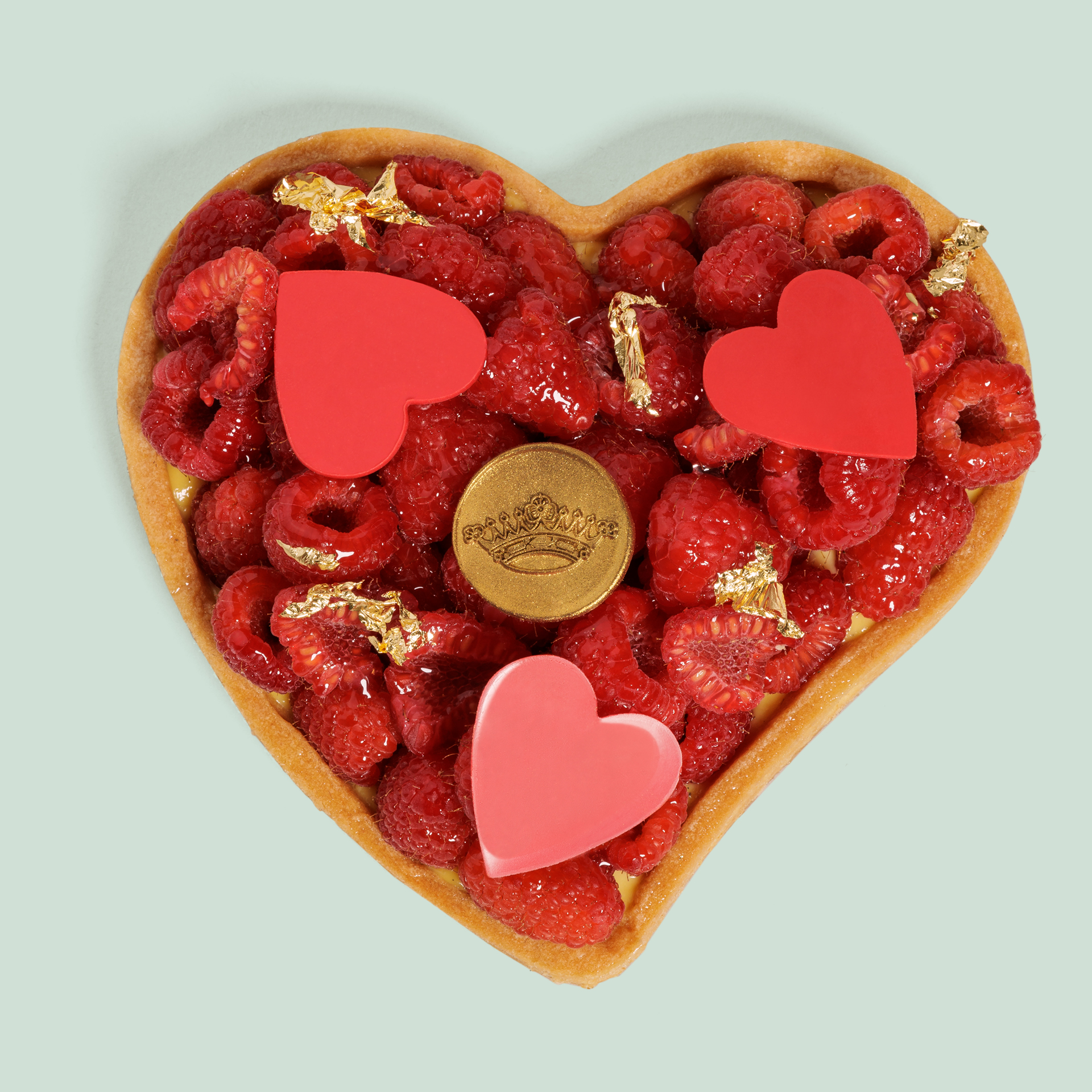 Heart-shaped tart with raspberries