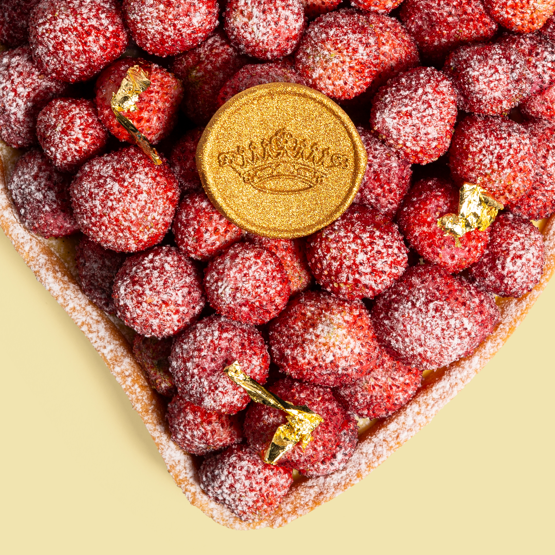 Heart-shaped tart with wild strawberries