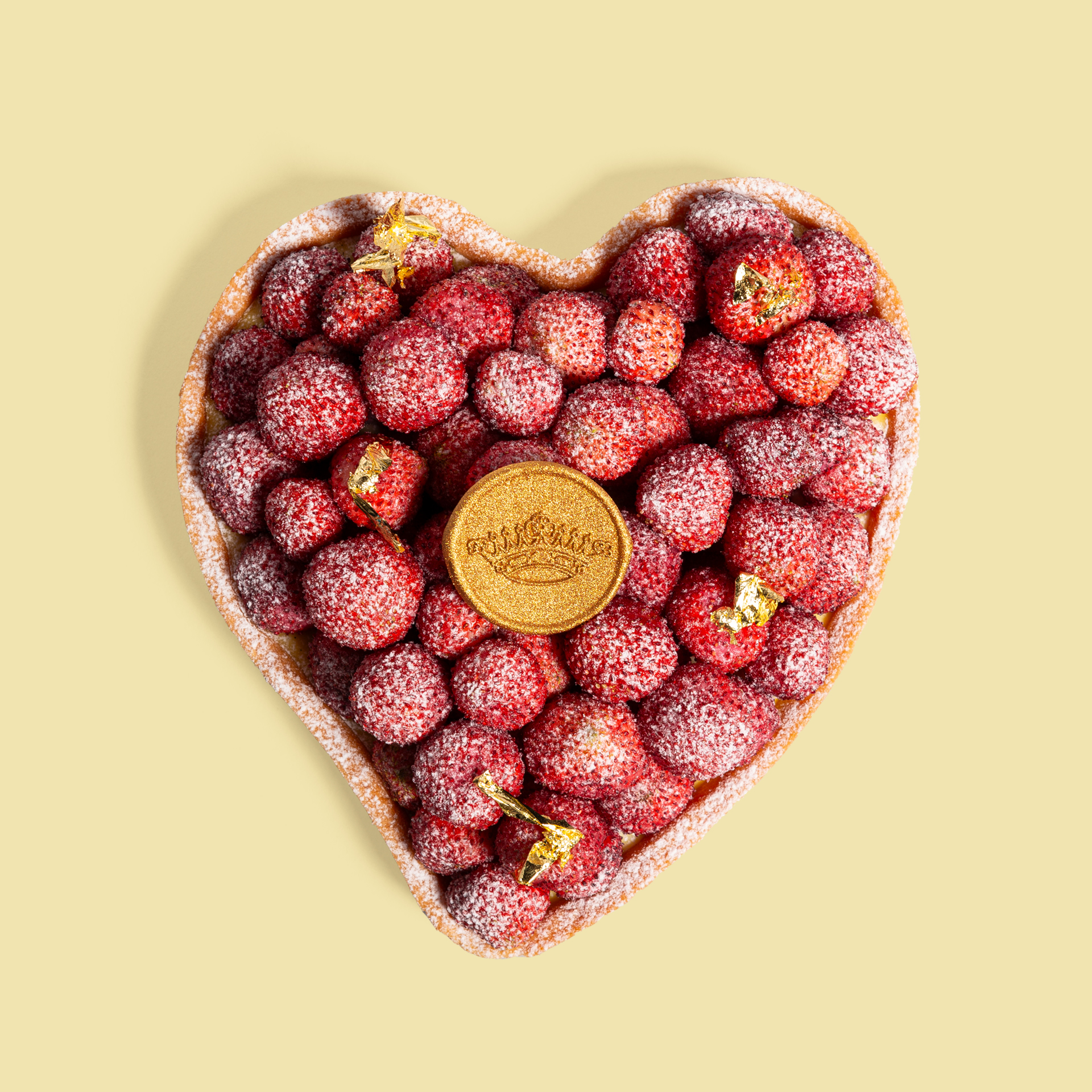 Heart-shaped tart with wild strawberries